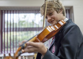 Student playing violin